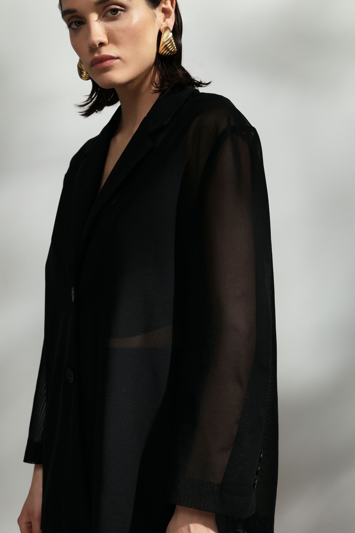 Blazer transparent avec fermeture à un seul bouton