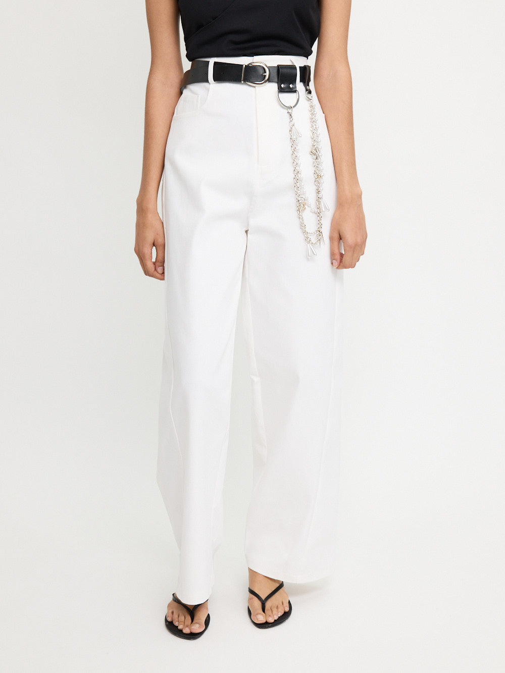 Pantalon à poches arrière asymétriques
