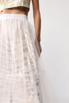 Long metallic-effect skirt with waistband