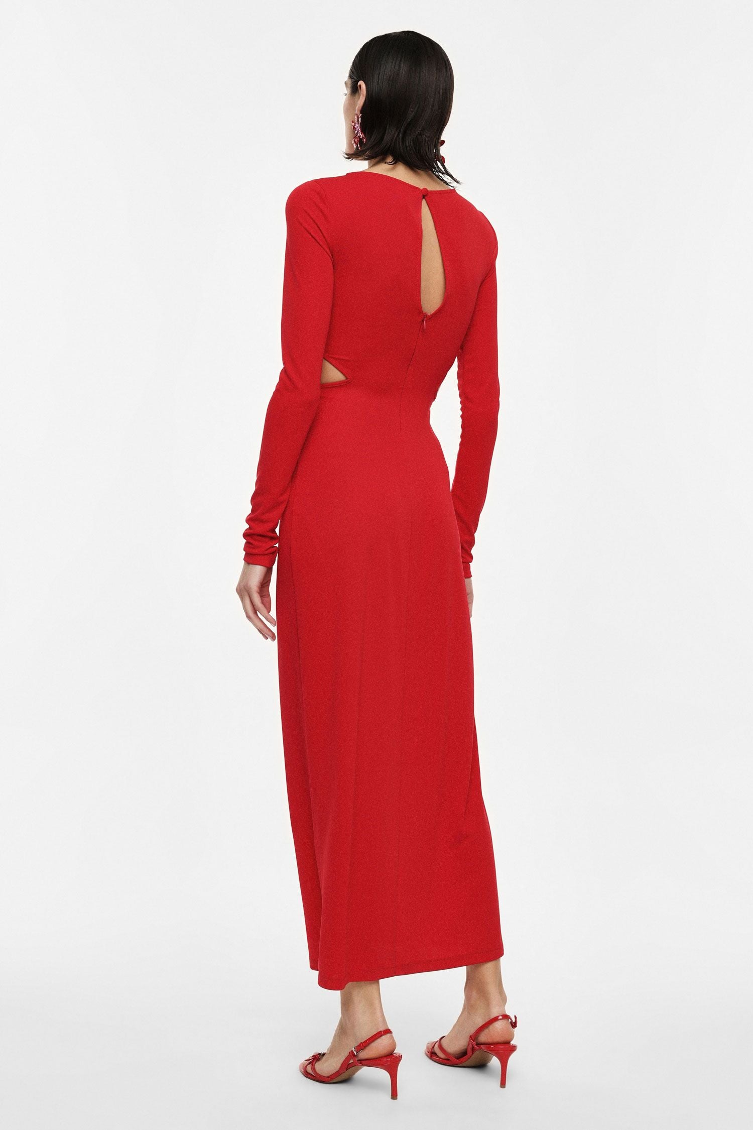 Long dress with long sleeves and side cut-outs