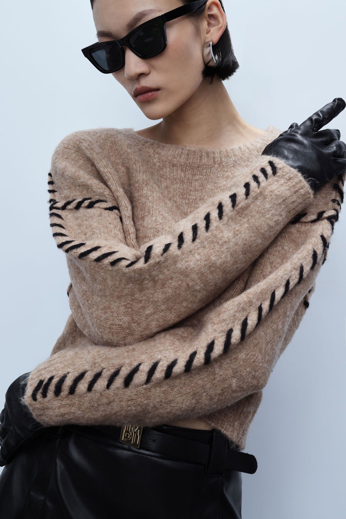 Sweater with crossed side details