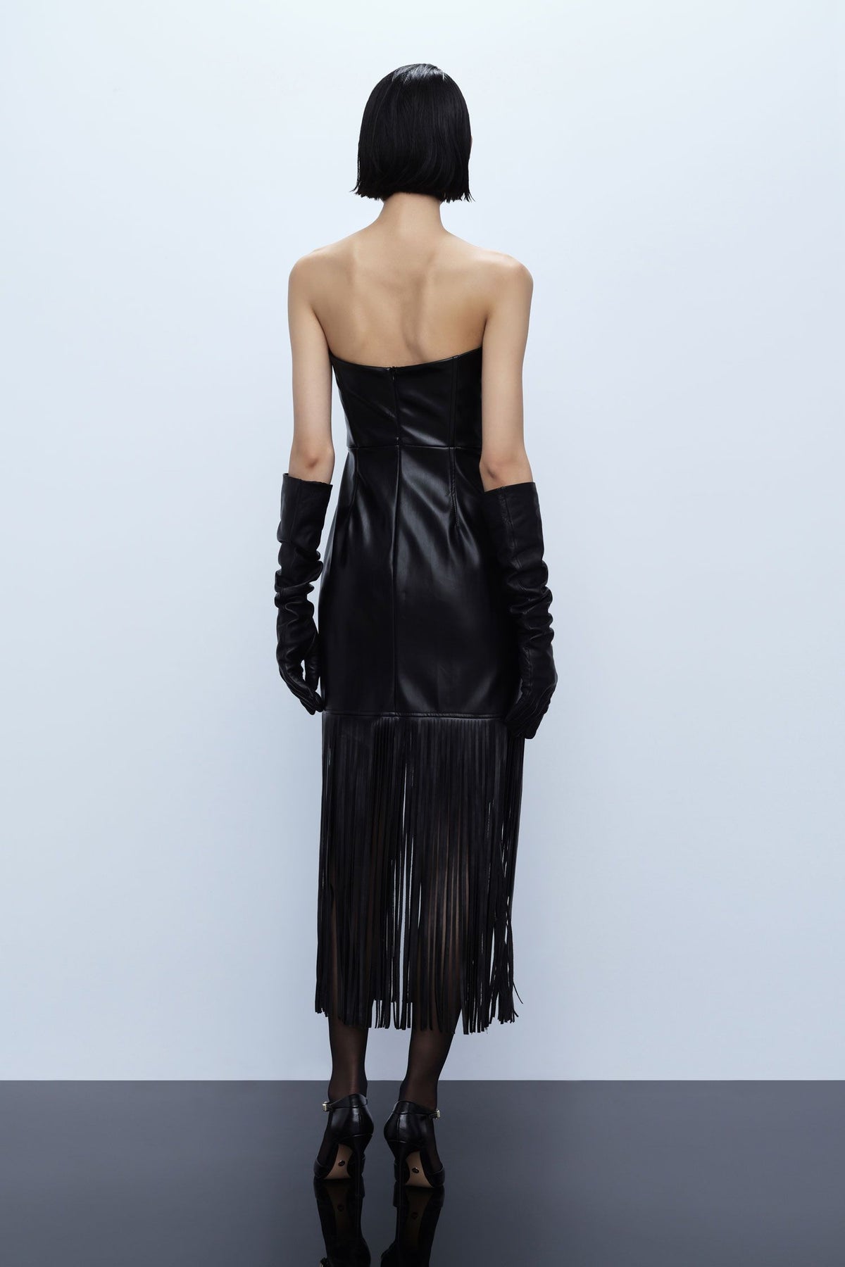 Faux leather midi dress with fringes