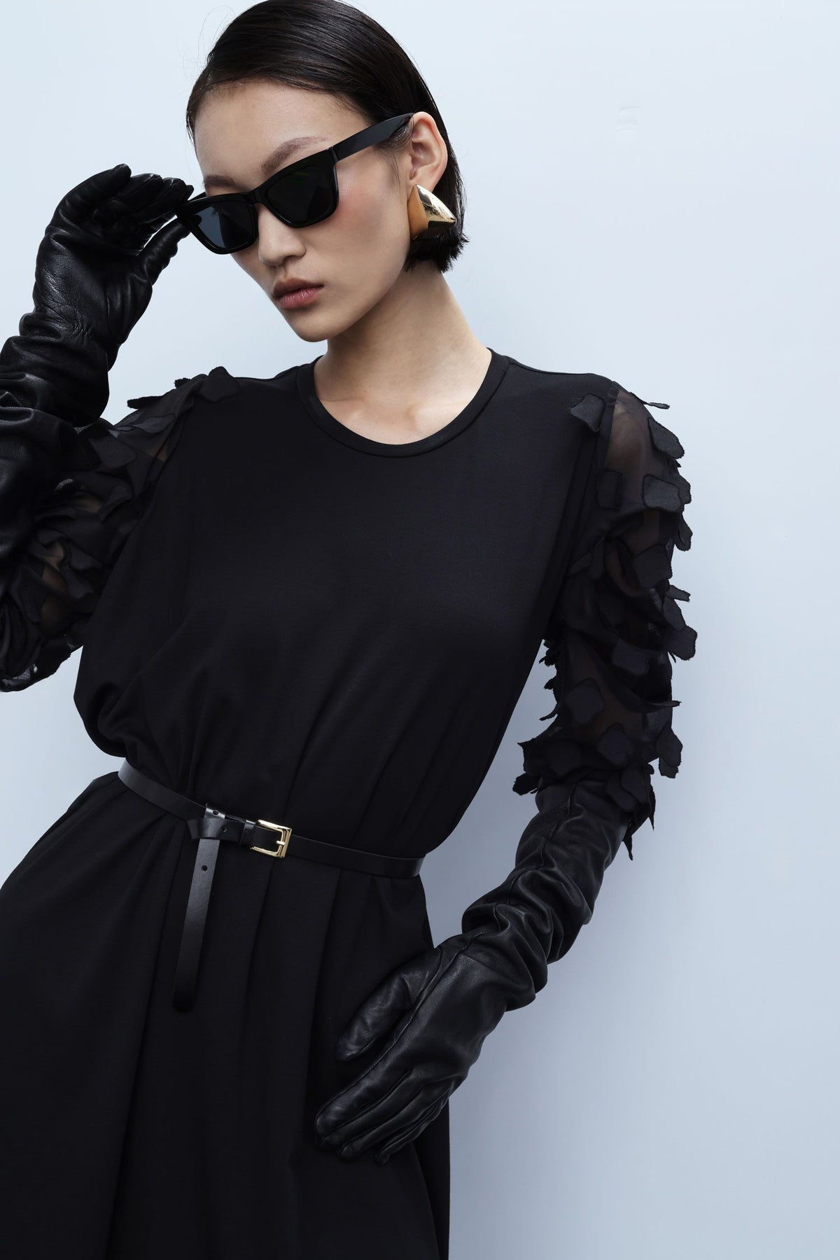 Dress with textured sleeves