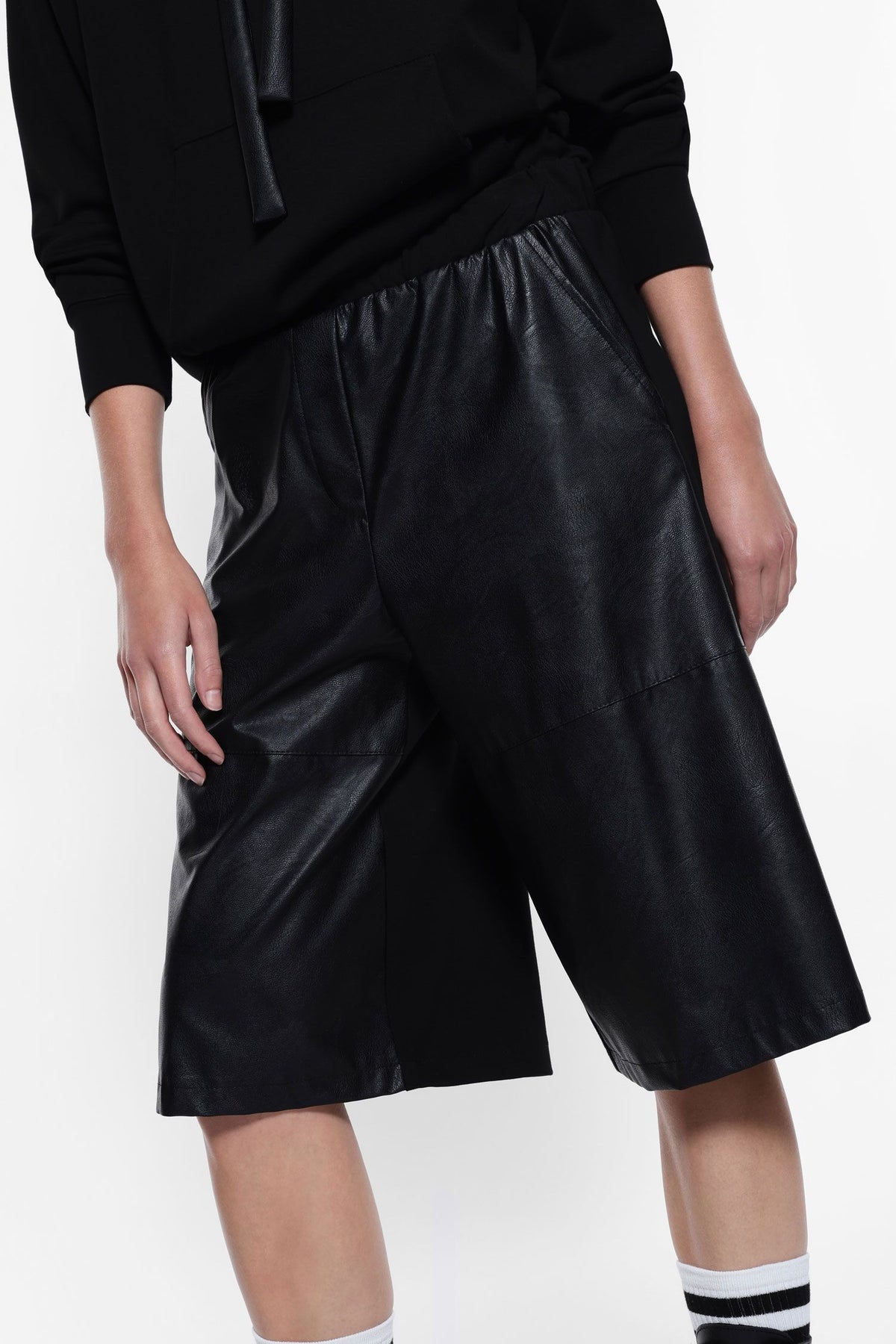 Knee-length shorts in faux leather and fabric