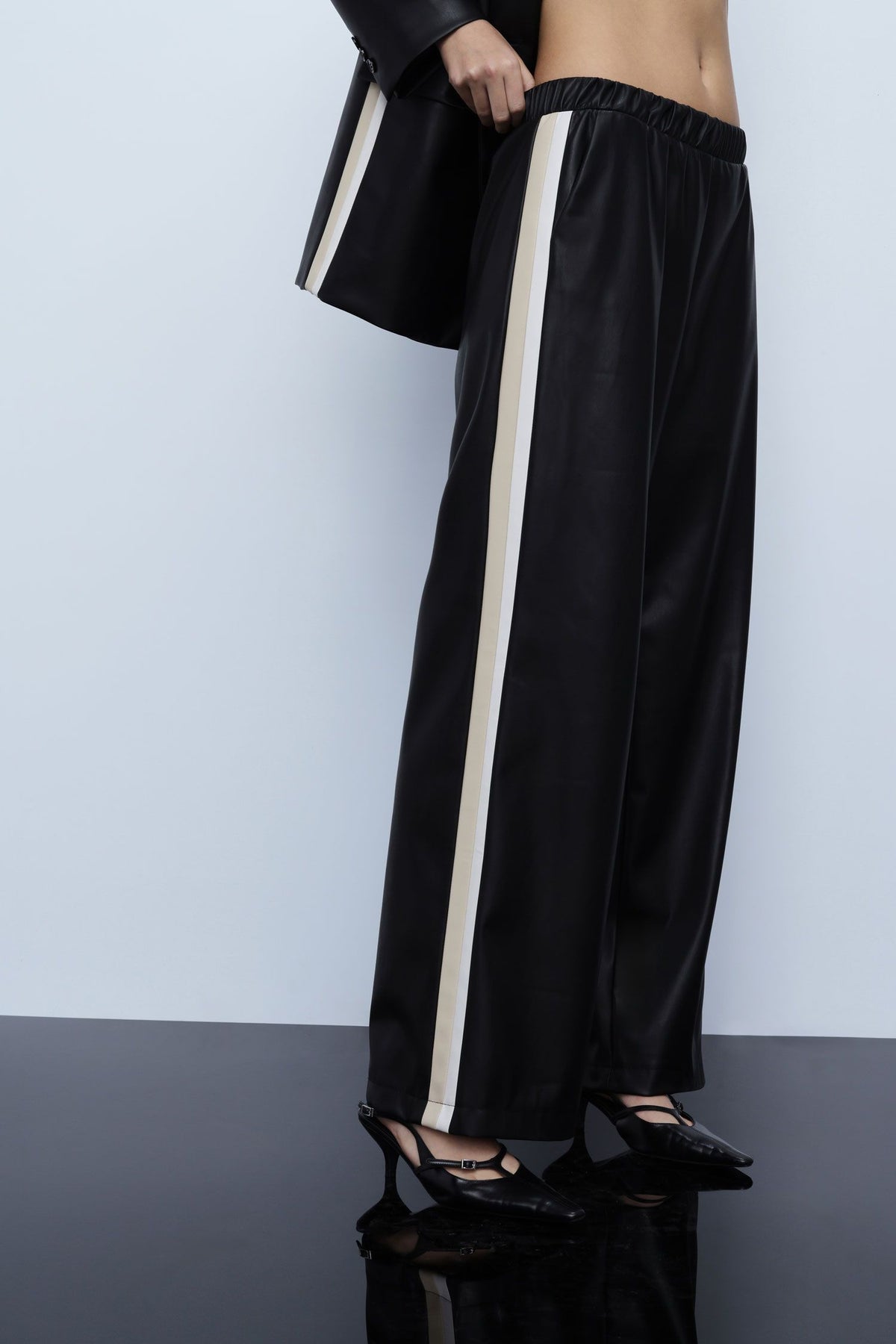 Wide-leg trousers in faux leather