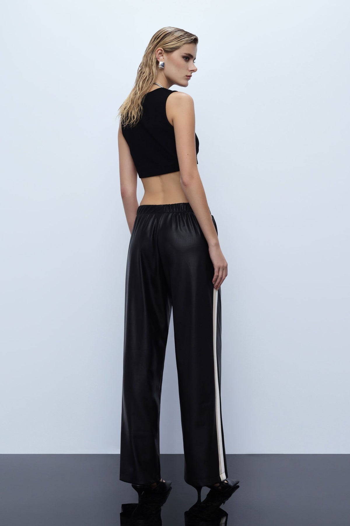 Wide-leg trousers in faux leather