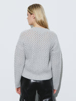 Knitted zip-up sweater