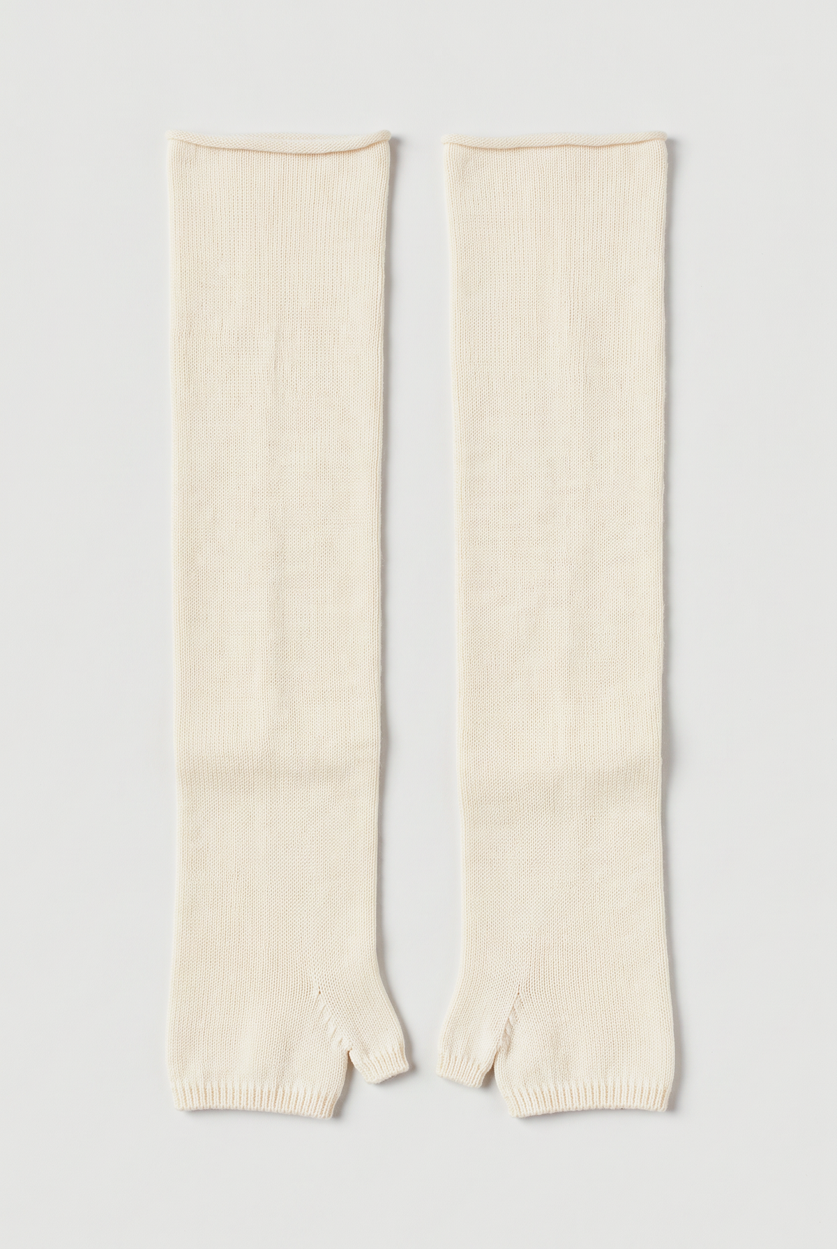 Long fingerless knit gloves in Cream