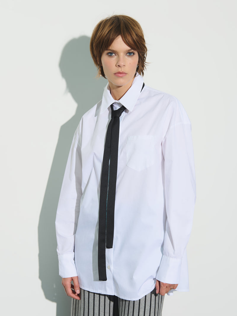 Oversized blouse with tie