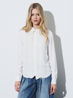 Front ruffle detail blouse