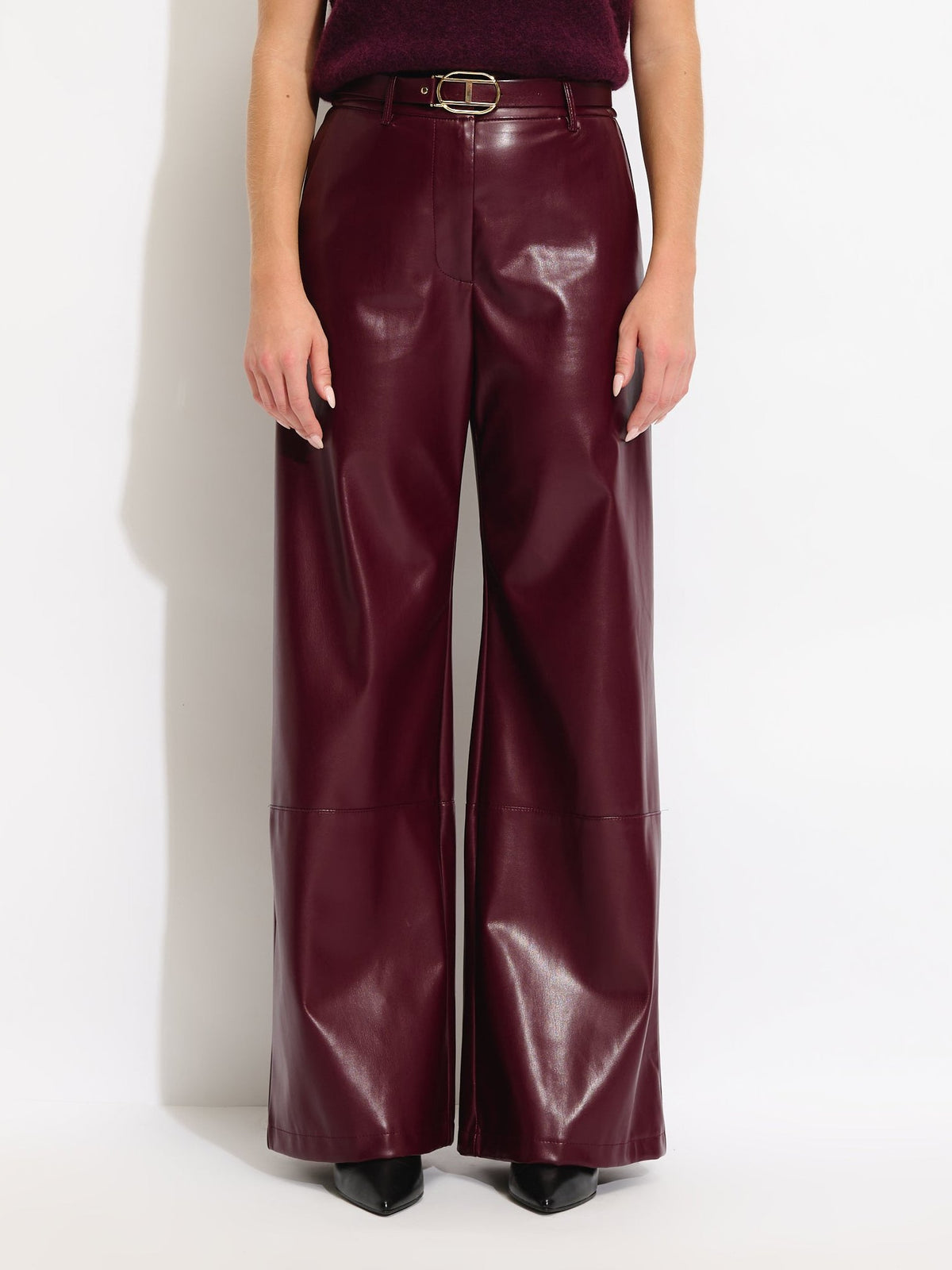 Pantalon ceinturé en similicuir