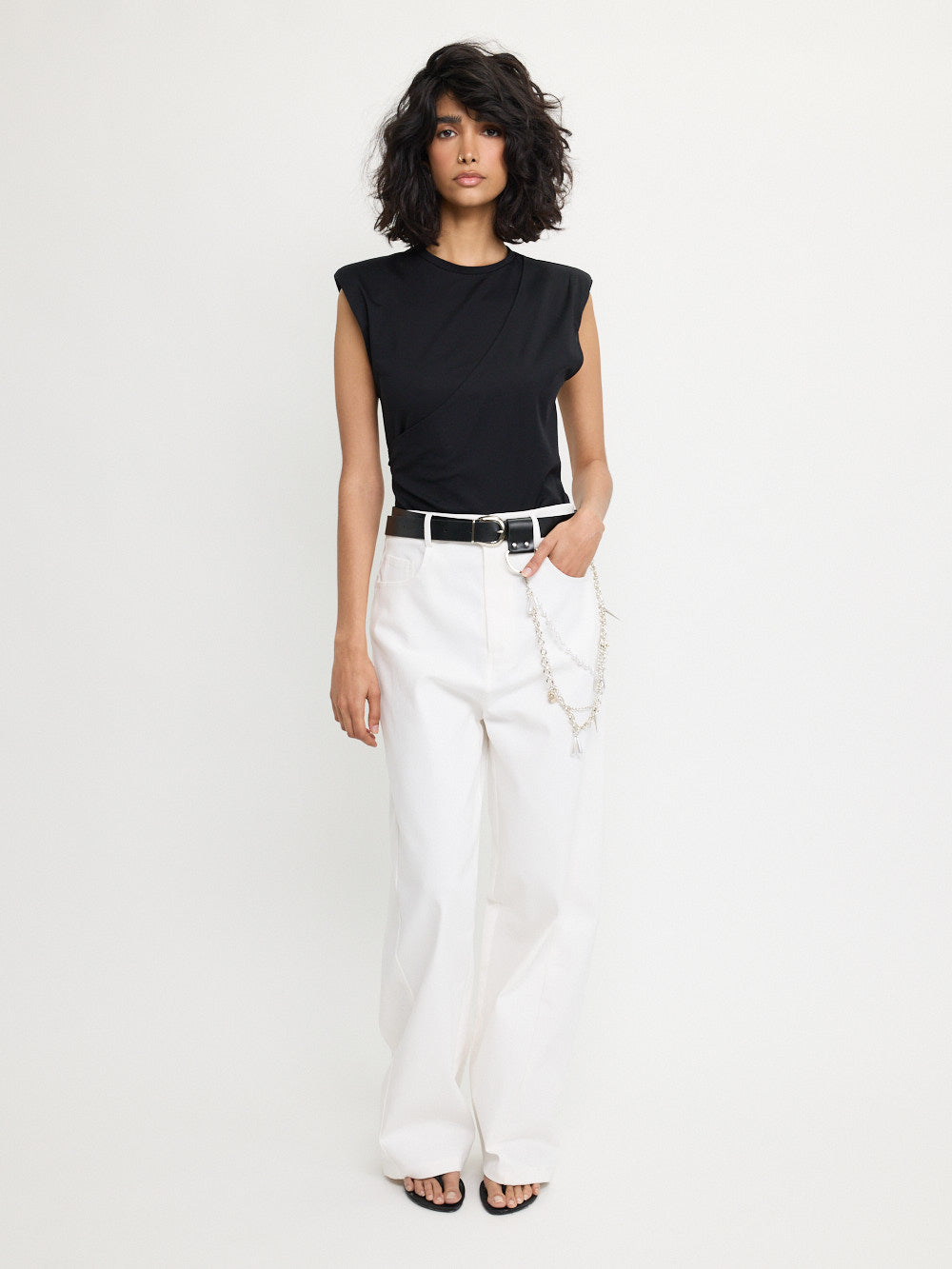 Pantalon à poches arrière asymétriques