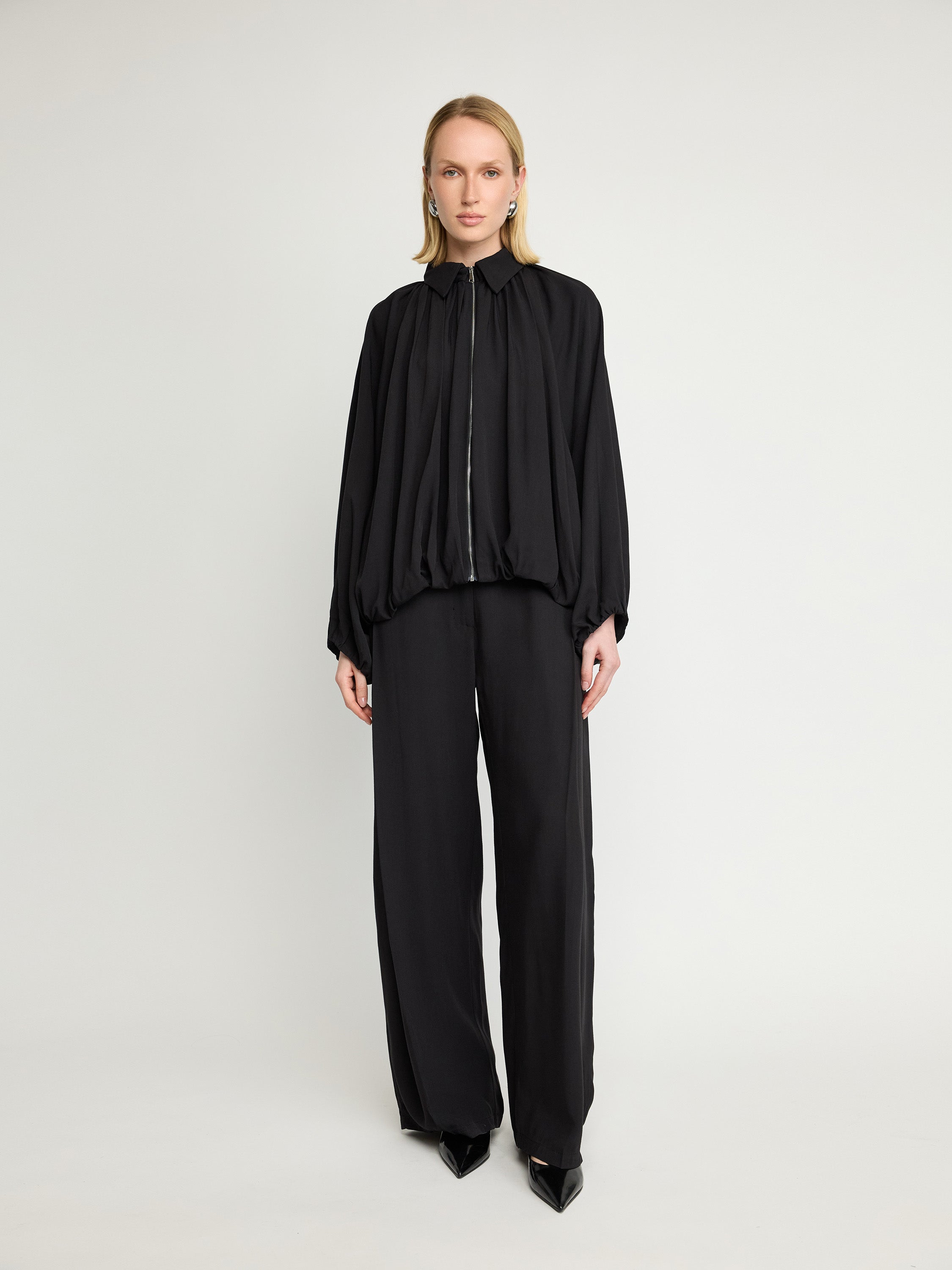Veste zippée drapée à manches chauve-souris