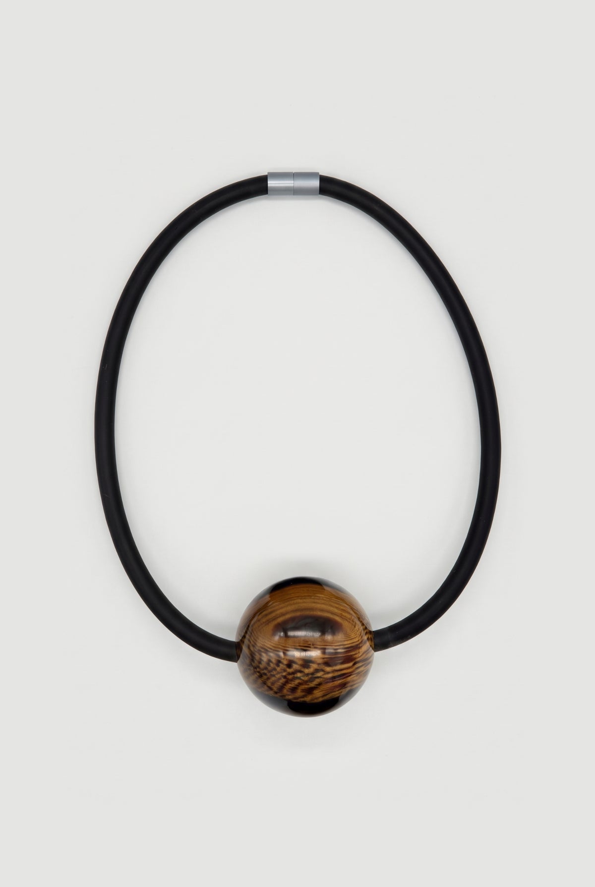 Cord choker with one large bead - Black + tiger - still