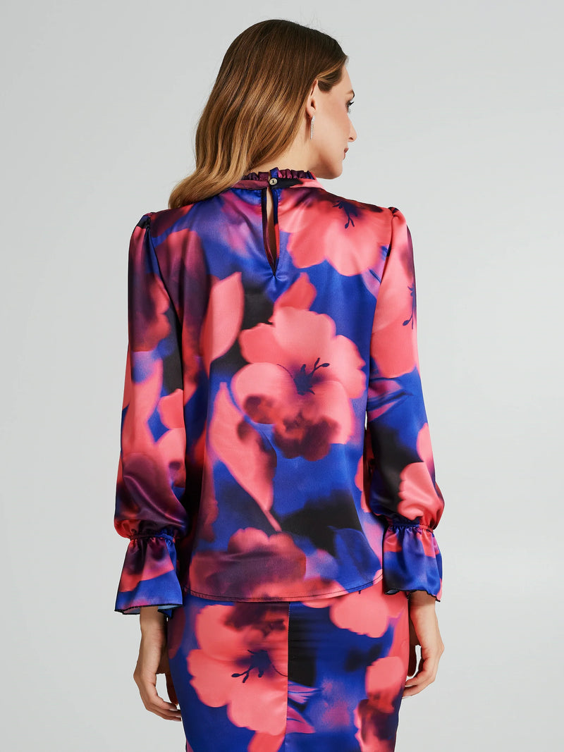 Turtleneck blouse with a floral print